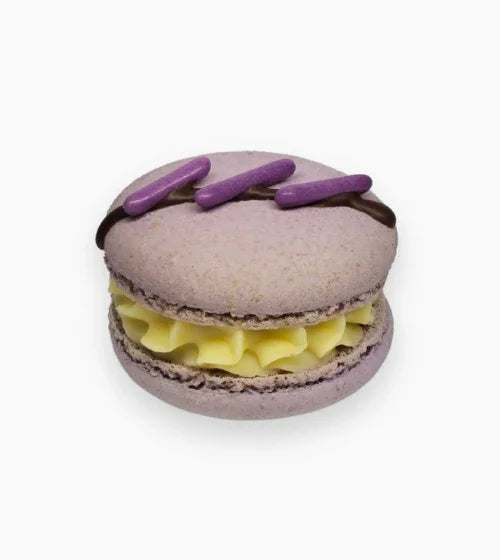 Lavender macaron with lilac shells, lavender cream, and purple chocolate swirl