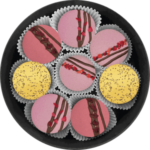 Berry Bloom macarons in raspberry-pink and lemon with chocolate drizzle and poppy seeds