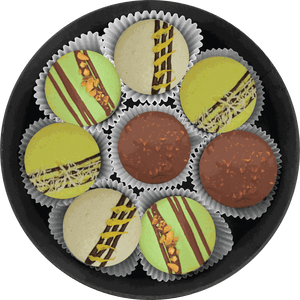 Luxurious Royal Pistachio macarons with chocolate drizzle and nutty cream filling in a vibrant green set